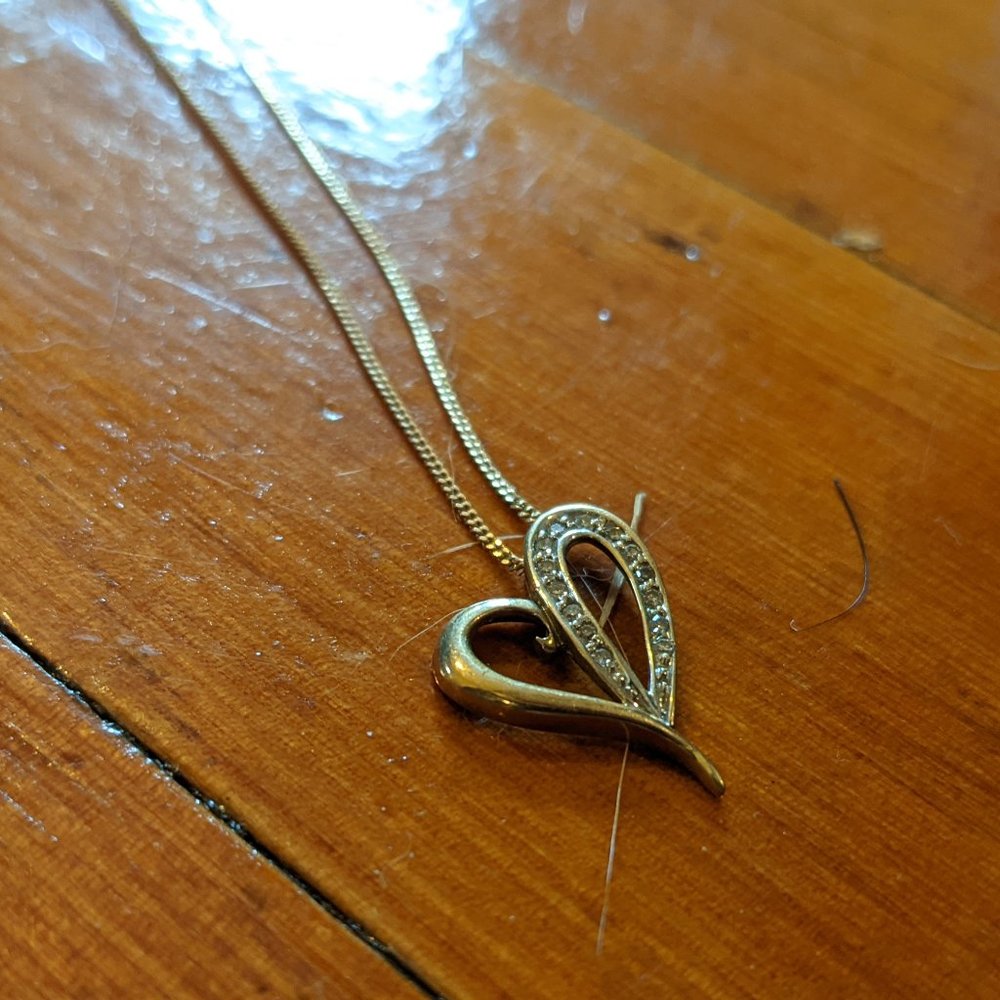 Gold and diamond heart necklace